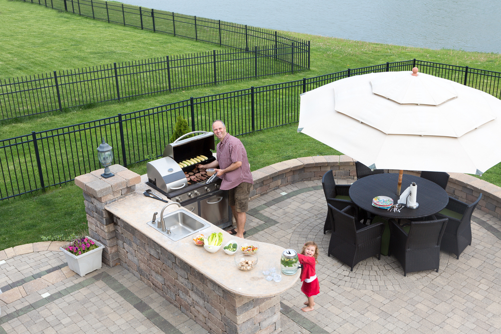 Father,And,Daughter,Preparing,A,Barbecue,At,An,Outdoor,Summer