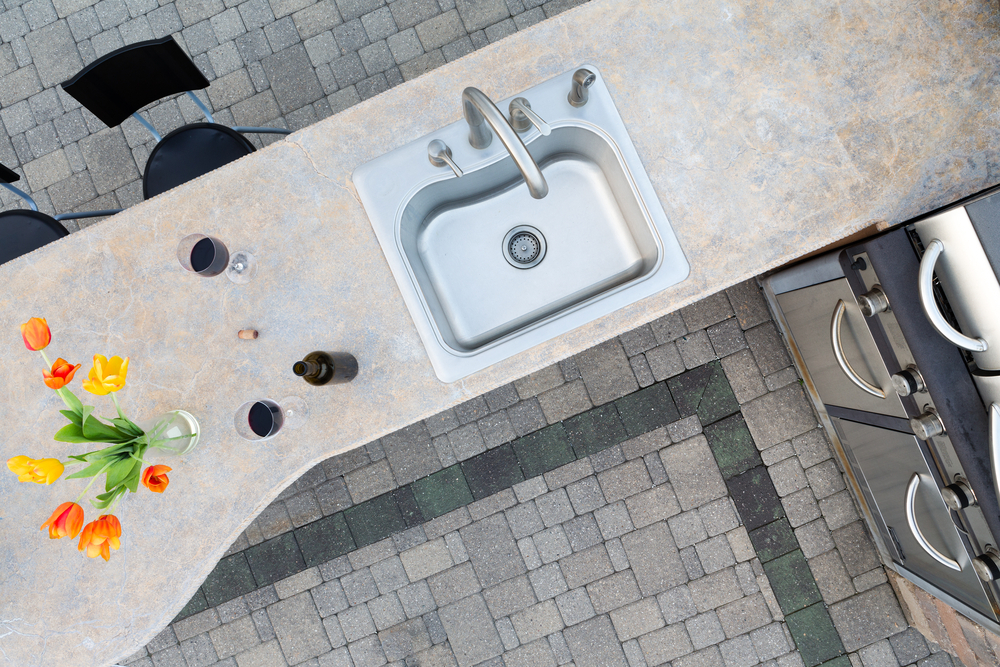 Exotic,Concrete,Counter,Top,And,Sink,In,An,Outdoor,Kitchen