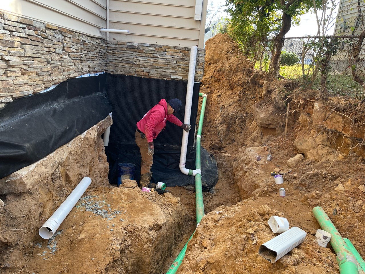 Adjusting drainage system to prevent water intrusion
